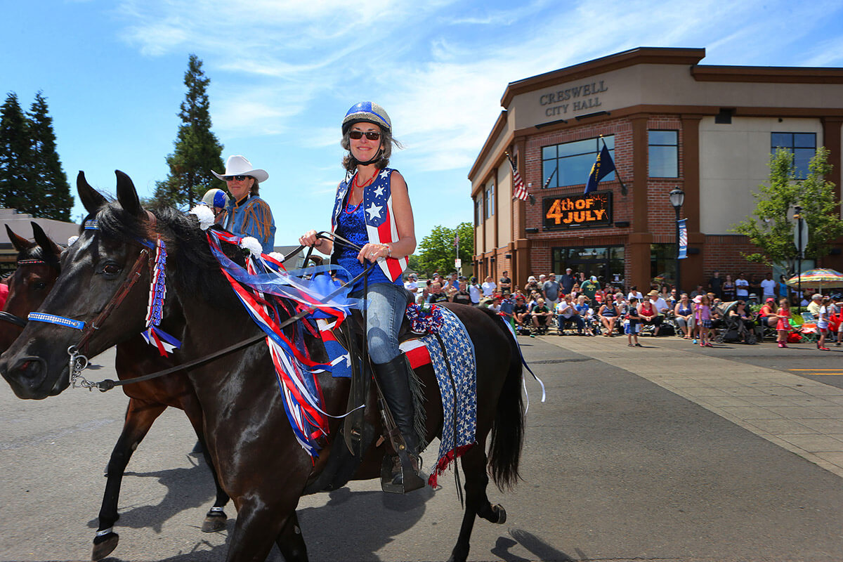 A woman on a horse at the Creswell 4th of July parade